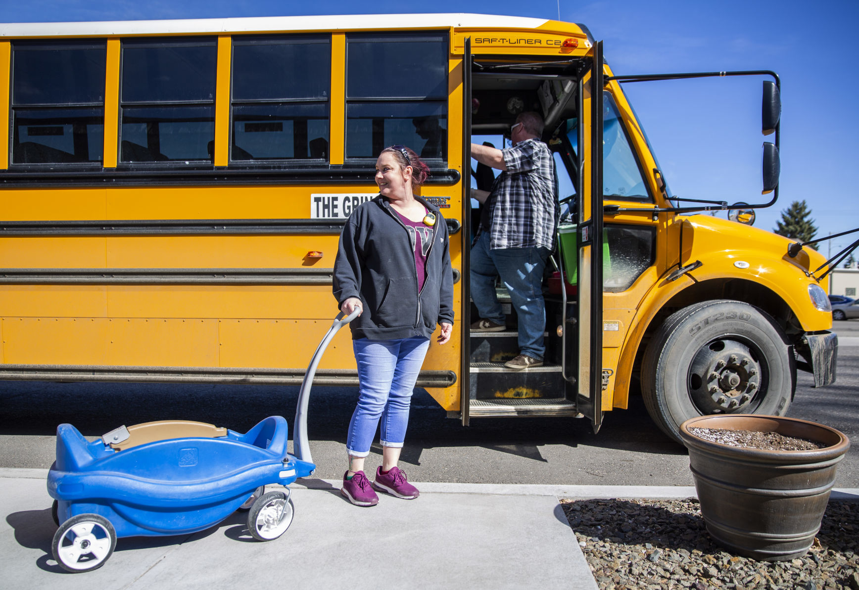 Bus drivers deliver food to students